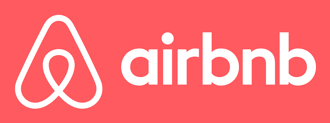 A red background with the word airbnb written in white.